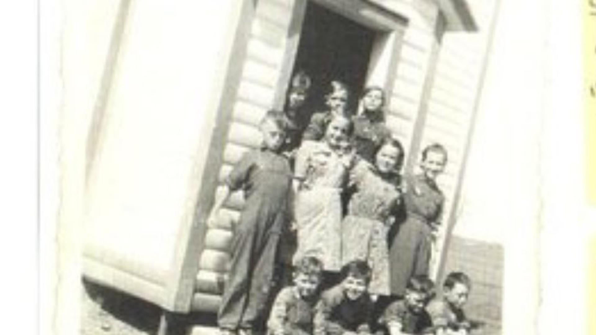 Old photograph taken in the 1940's showing kids in front of a Plantagenet one room school