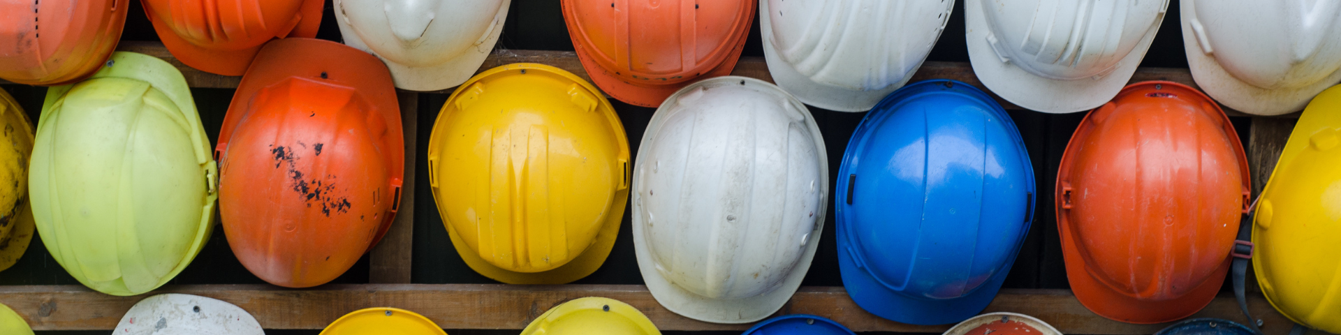 Rows of colorful safety helmets