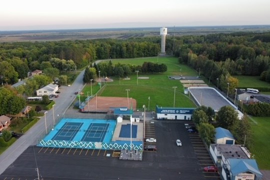 View of the Alfred Park from the sky with the Tennis courses and the water tower shown.