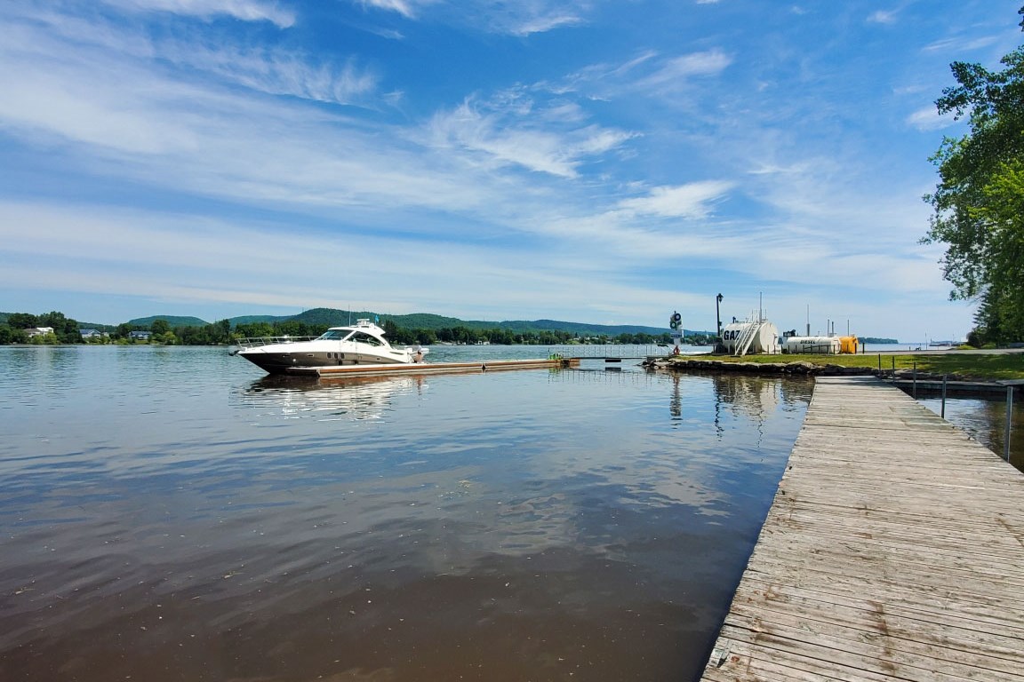 View of a dock on the Ottawa River with a boat
